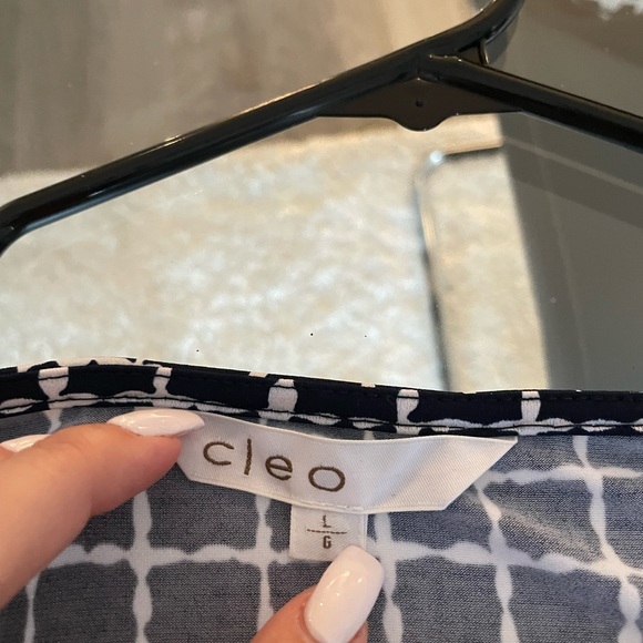 New without tags black and white blouse with tie. Size L - Picture 2 of 2